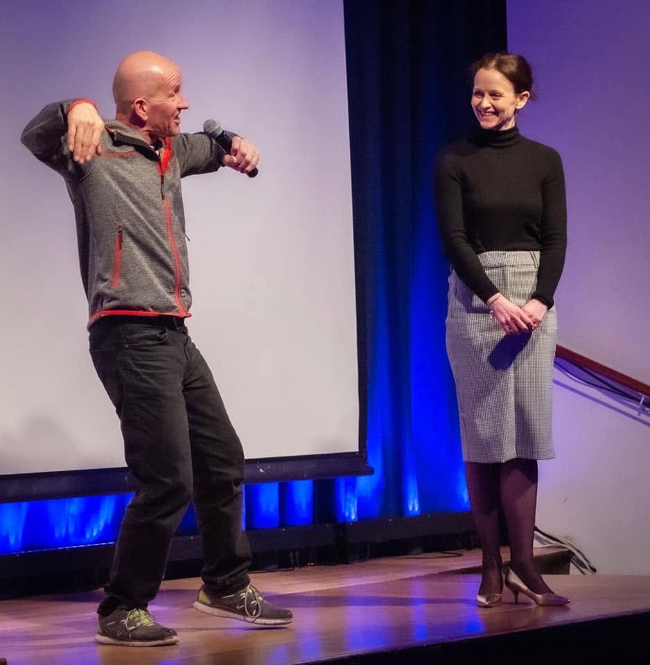 A lively community event on stage at the Clubhouse